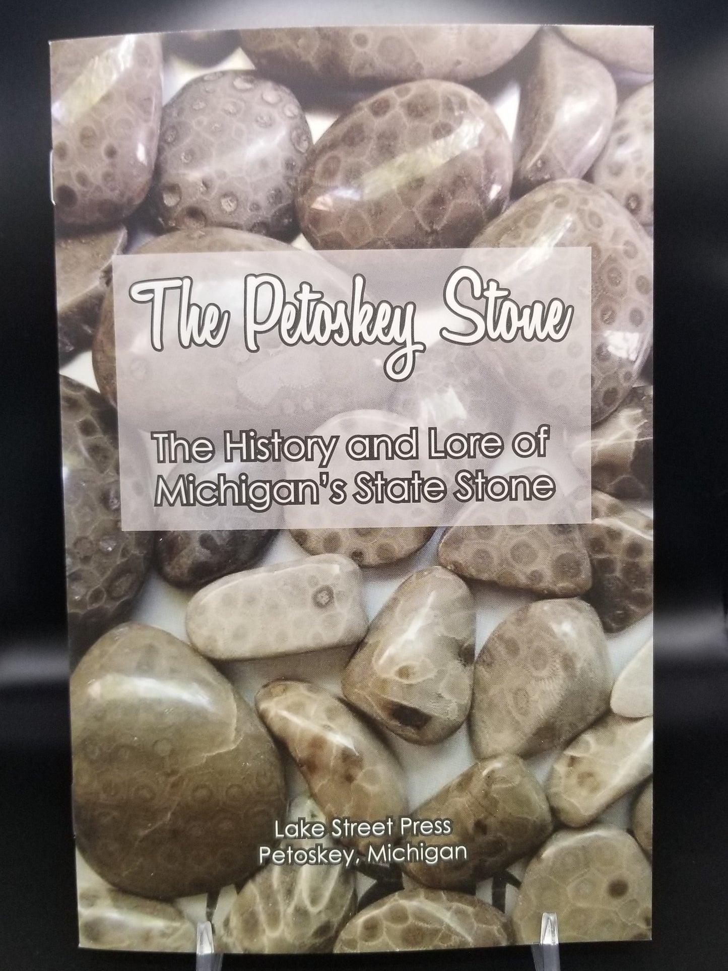 Front cover of the "history and lore of michigan's state stone" along with local tips are tricks to finding the infamous fossilized coral.