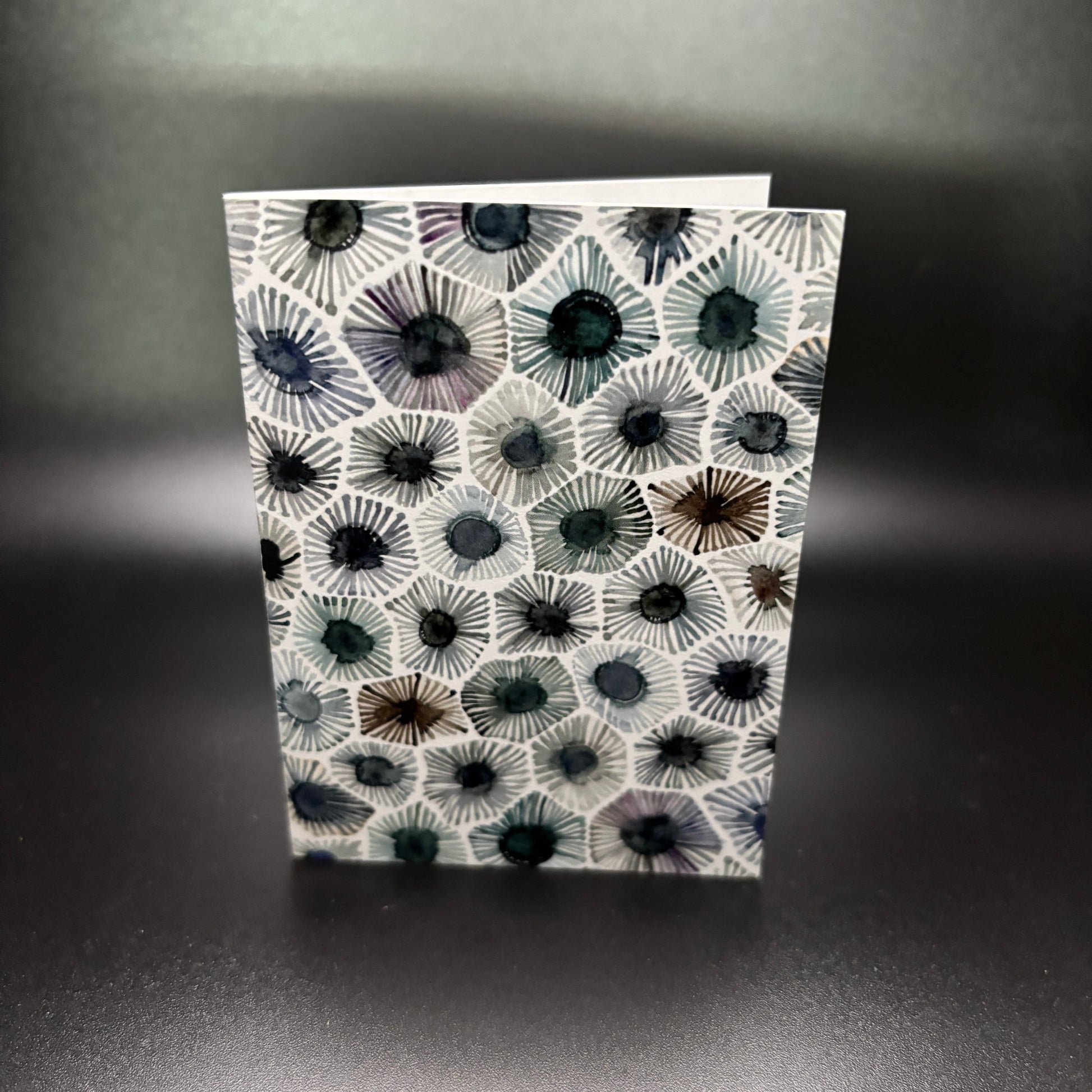 Petoskey Stone Watercolor Enclosure Card with a petoskey stone pattern 2.5 by 3.5 inches on a dark background