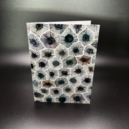 Petoskey Stone Watercolor Enclosure Card with a petoskey stone pattern 2.5 by 3.5 inches on a dark background