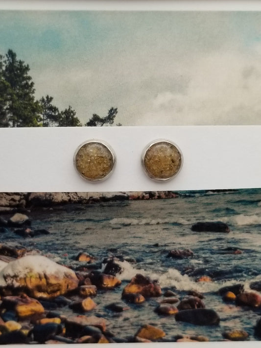 Set of stainless steel bezel earrings containing granules of sand from all five Great Lakes combined together. Handmade in Traverse City, Michigan. Local art you can wear.